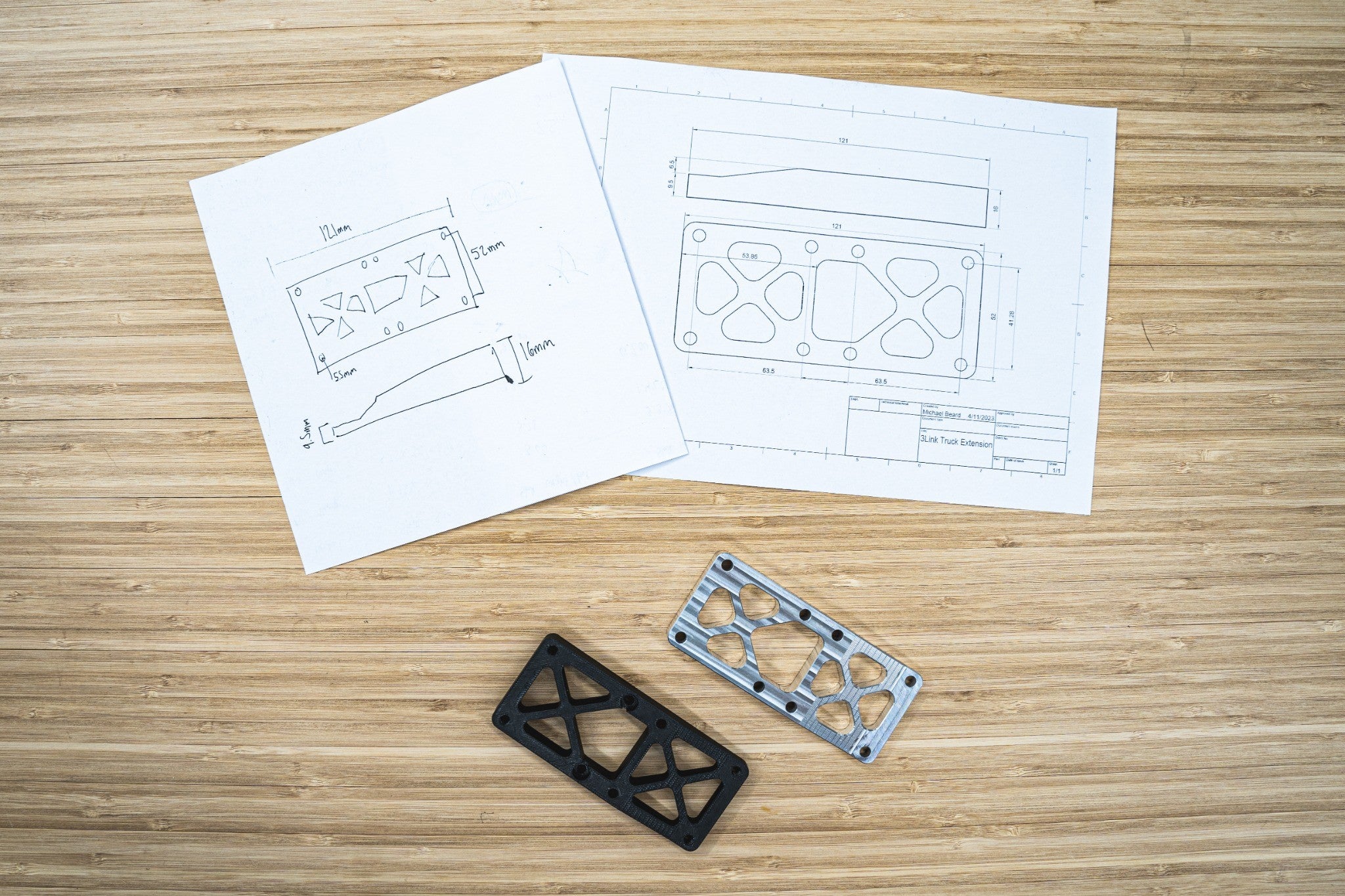 Engineering drawings alongside physical prototype components